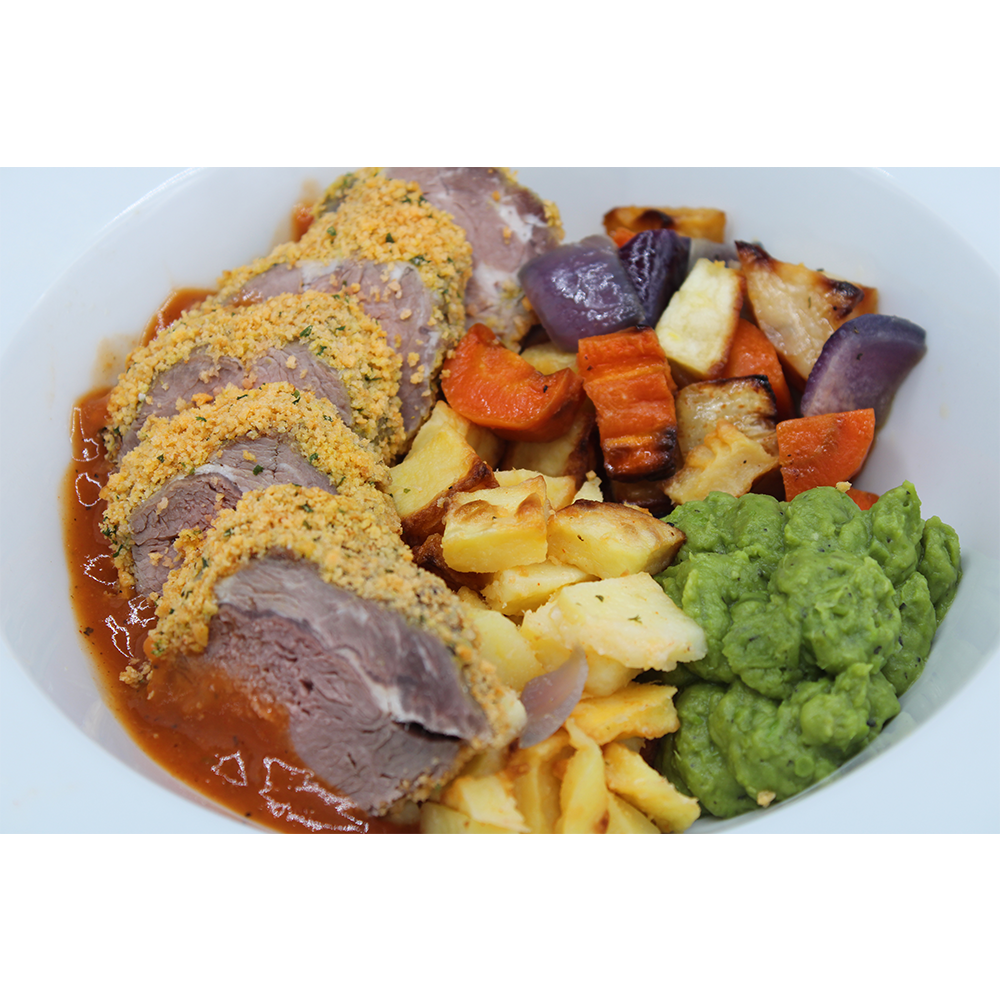 Rosemary Crusted Fillet of Lamb served with Minted Peas, Roasted Winter Vegetables and Parmentier Potatoes