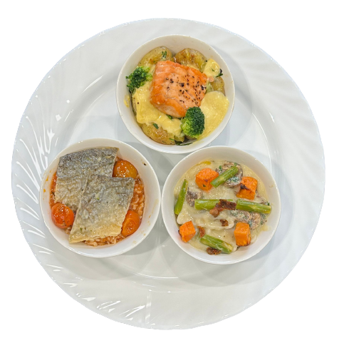 Pan fried Peppered Salmon on bed of Crushed New potatoes,  Baked Seabass on bed of Tomato Rice & Vegetarian Tortellini with Mushroom Sauce